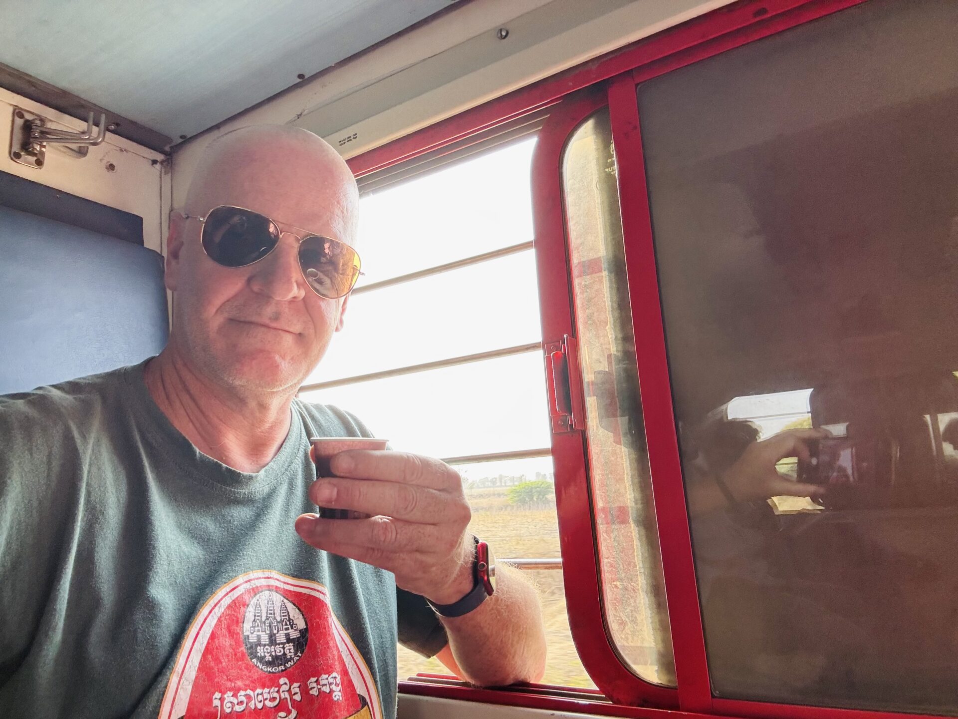 On a train in India, enjoying a chai